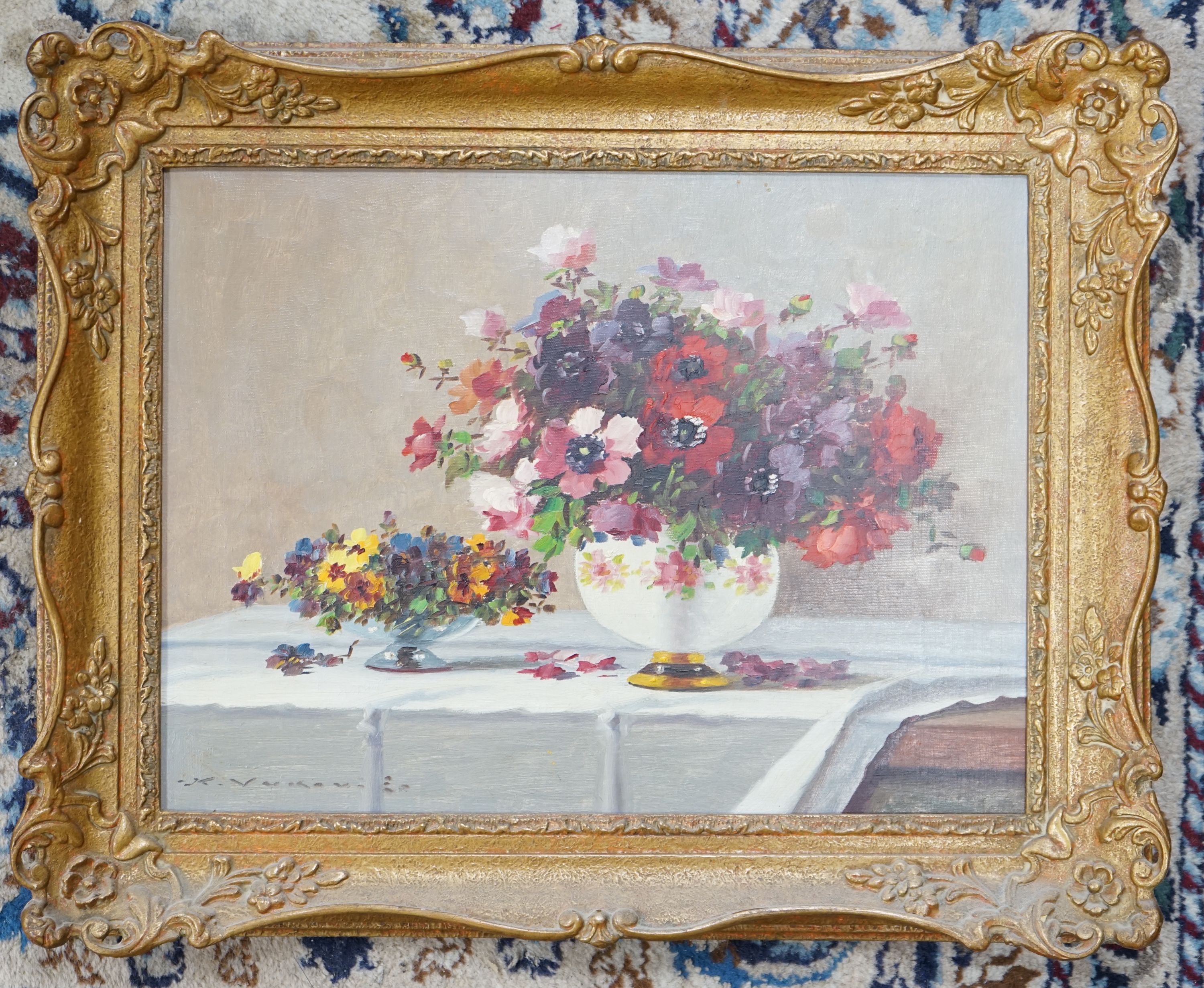 Karl Vukovic (1897-1973), oil on canvas, Still life of flowers on a table top, signed, Stacy Marks label verso, 30 x 40cm